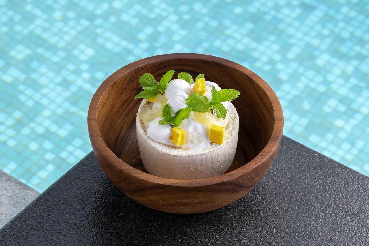 Centara Reserve Samui Strand von Chaweng Exterior foto A coconut ice cream with mango and mint